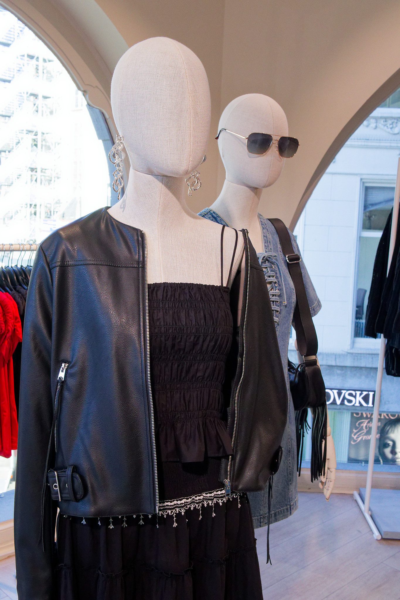 Black leather jacket and denim mannequins close-up
